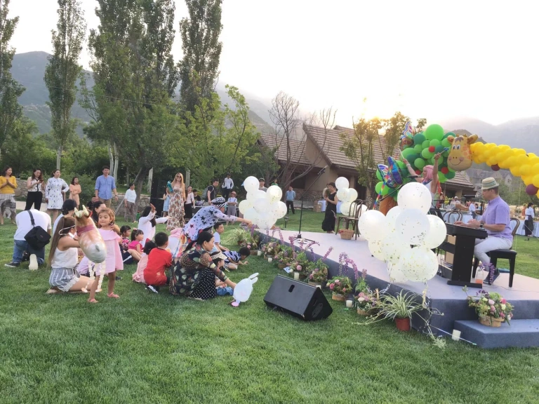 Photo from a Family Friends event gallery, featuring participants engaging in a community-building activity
