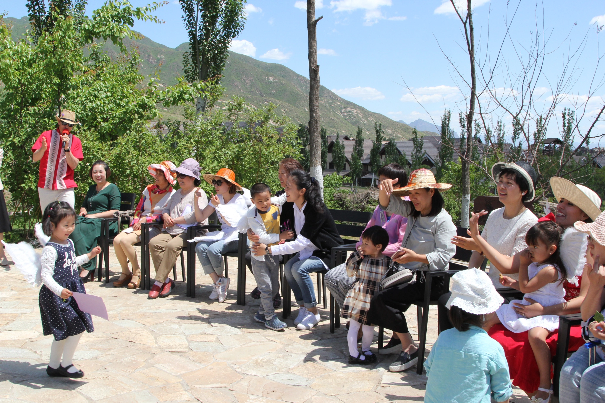 Families gathered at a Family Friends event, participating in activities and building community