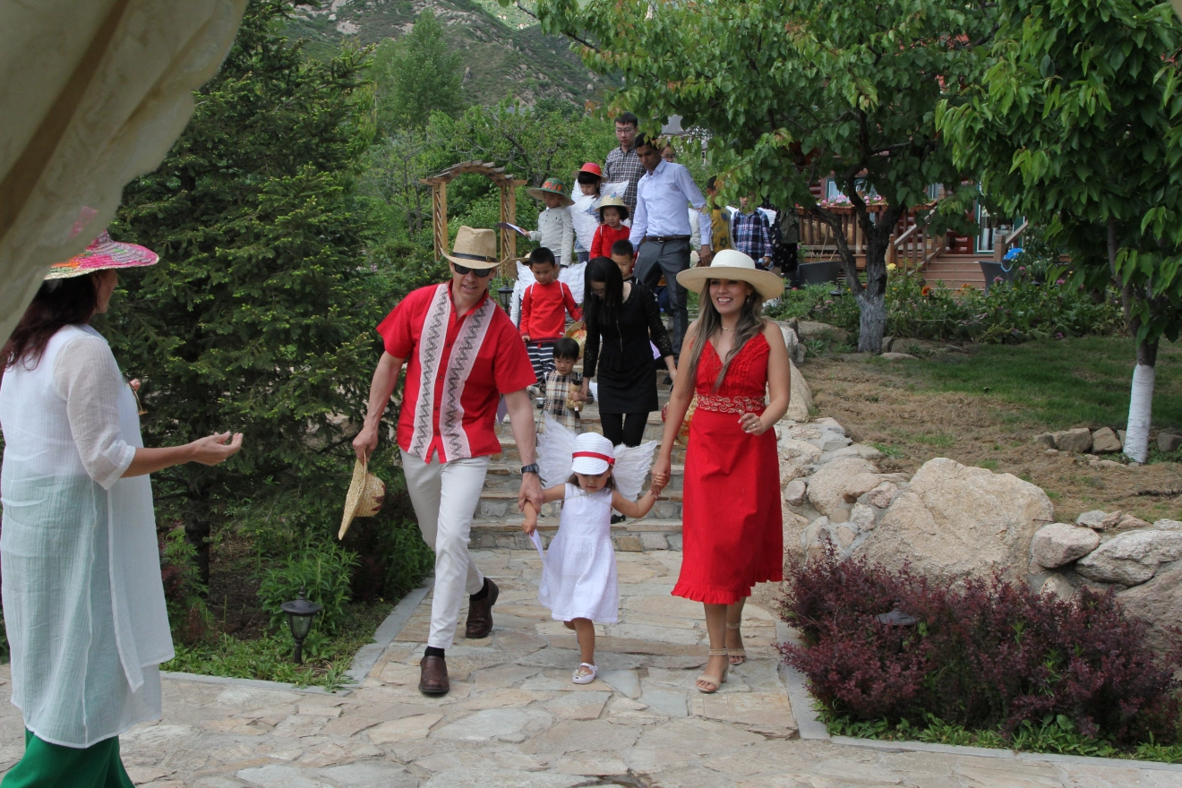 Families gathered at a Family Friends event, participating in activities and building community
