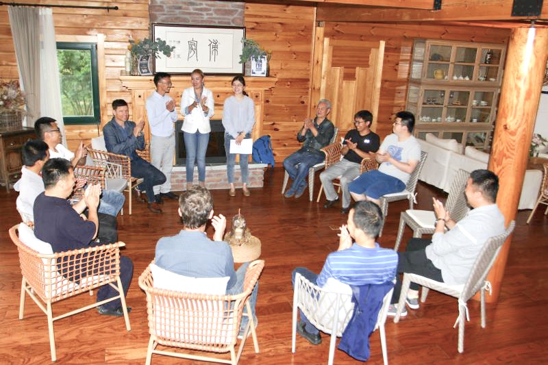 Parent participating in a sharing circle, promoting family communication and connection